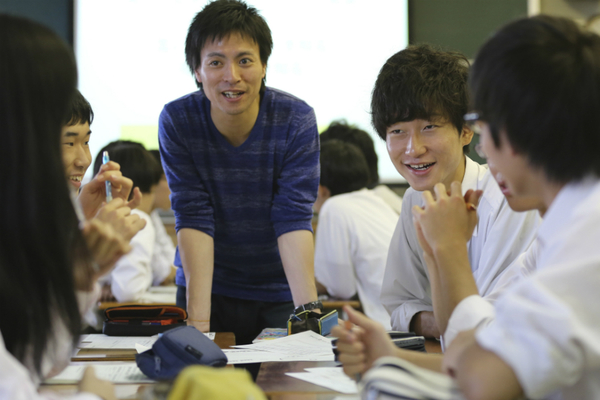 In this June 24 photo, Kensuke Harada, leader of nonprofit organization Youth Create, center, talks with high school students during a class on the election, at Denenchofu high school in Tokyo. Photo - Koji Sasahara/AP